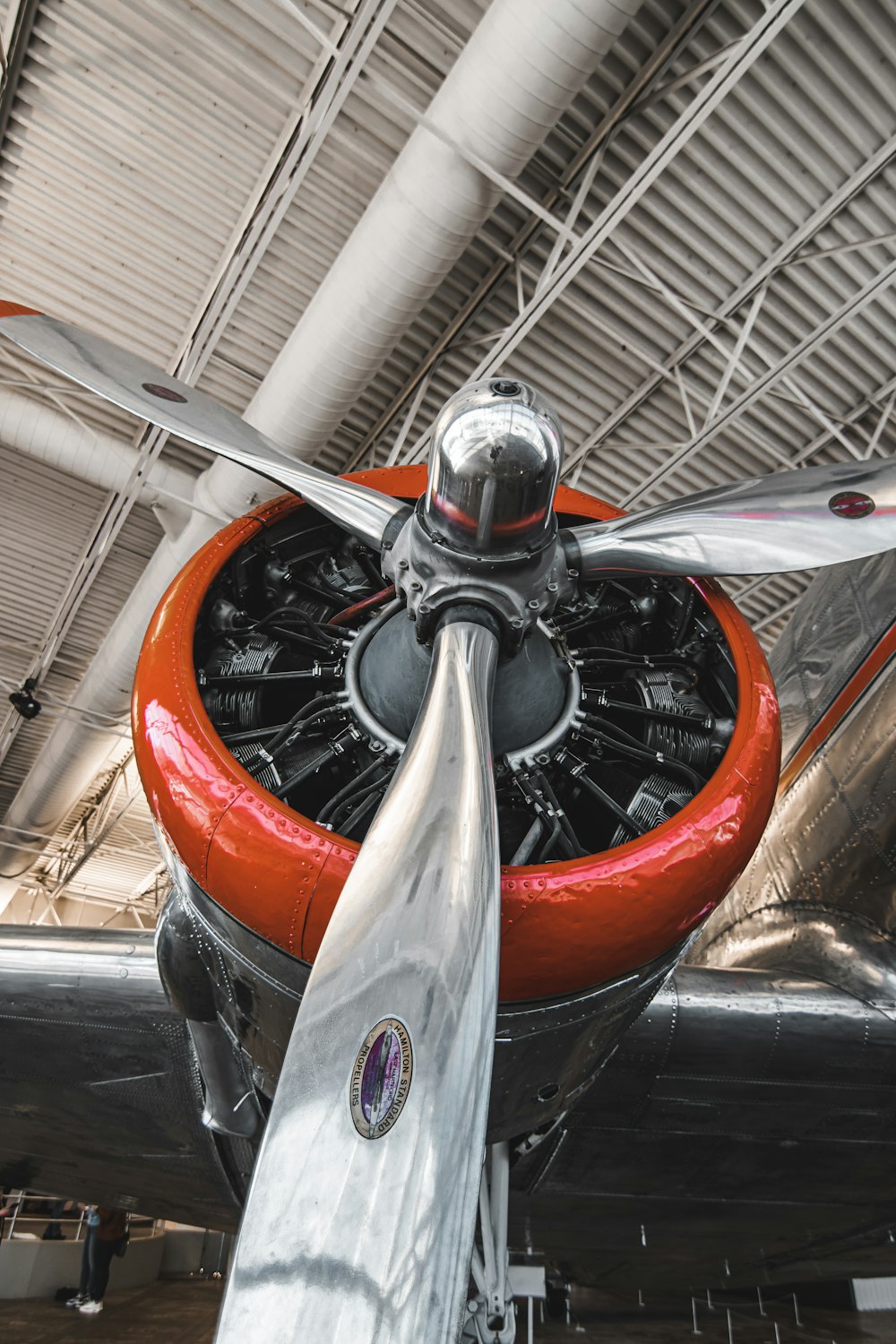 Close-up of a training aircraft propeller and engine cowling